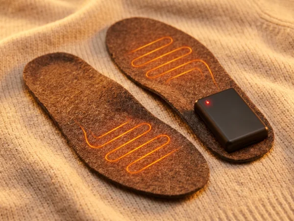 Battery-heated insoles for cold-weather footwear